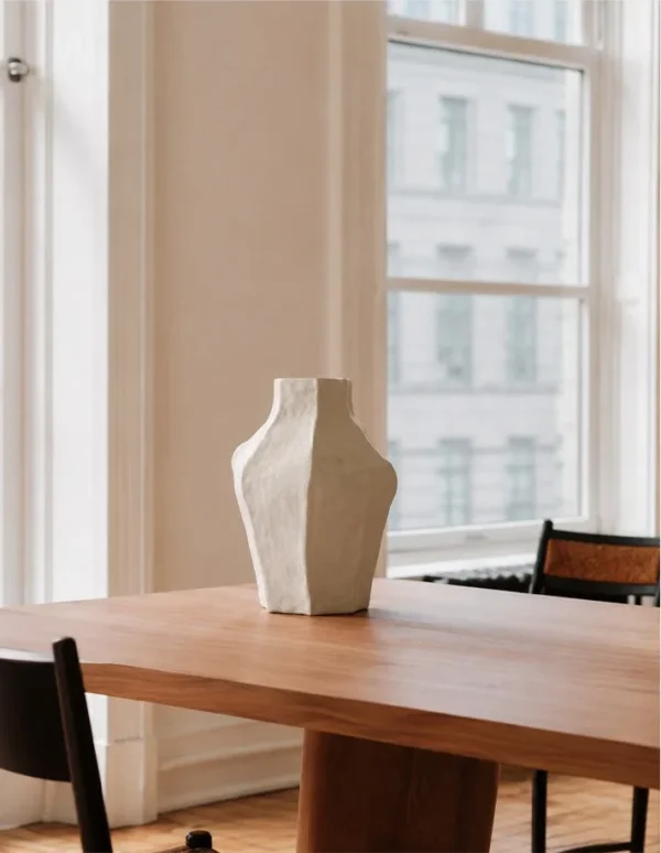 Designer Irregular Faceted White Ceramic Vase, Small or in ivory — in a room setting