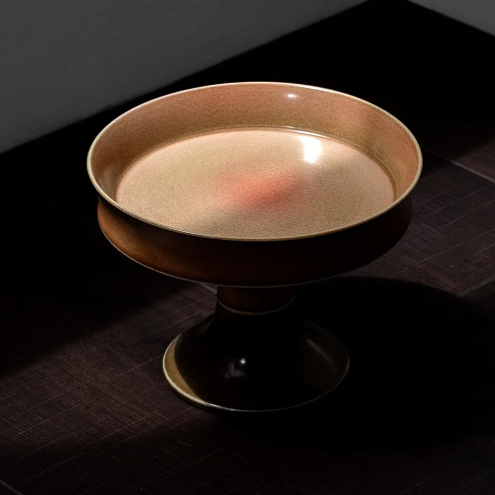 Kiln-Glazed Footed Ceramic Fruit Plate in bronze — front view