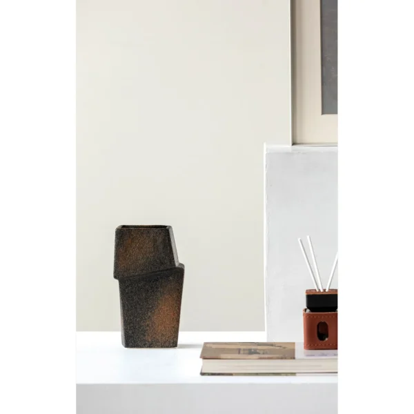 Hand-Made Offset Geometric Square Vase in Black and Rust — in a room setting