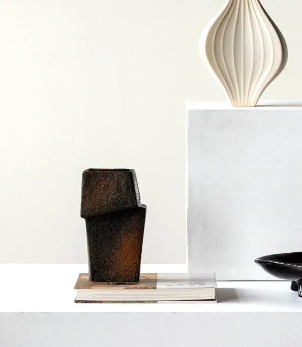 Hand-Made Offset Geometric Square Vase in Black and Rust — in a room setting