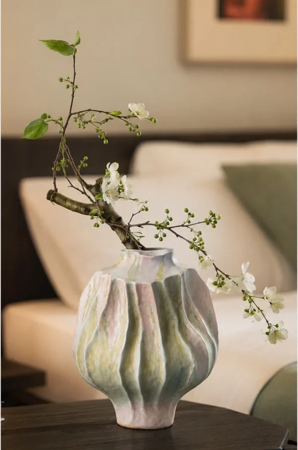Hand-Made Pleated Ceramic Vase in Moss and Rose Glaze — in a room setting