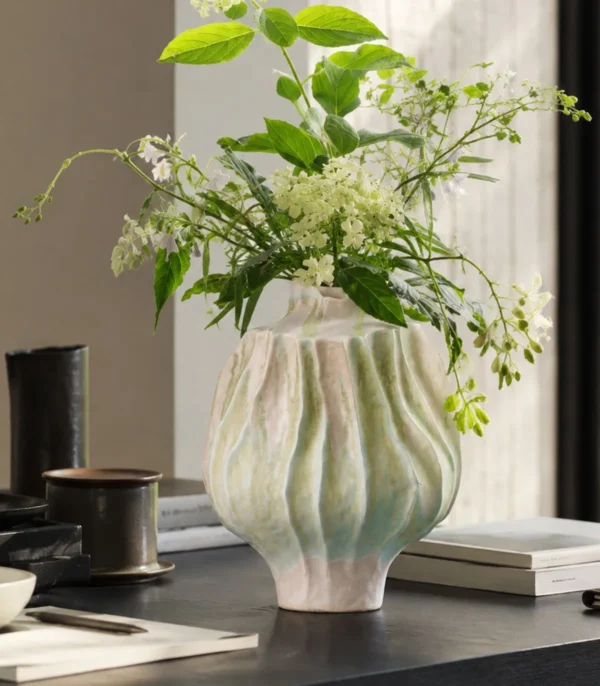Hand-Made Pleated Ceramic Vase in Moss and Rose Glaze — in a room setting