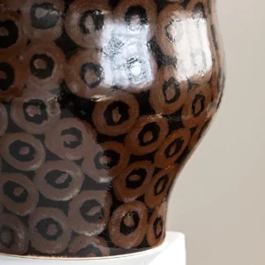 Hand-Made Ring Pattern Gourd Vase in Dark Brown Glaze — in a room setting