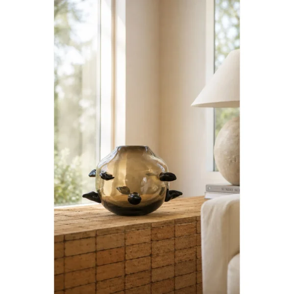 Hand-Made Smoked Glass Sphere Vase with Black Thorns in slate — in a room setting