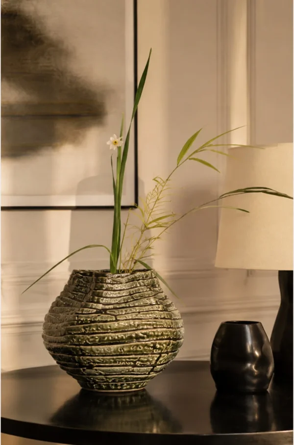 Hand-Made Spiral Layered Stoneware Vase in Moss Green — in a room setting