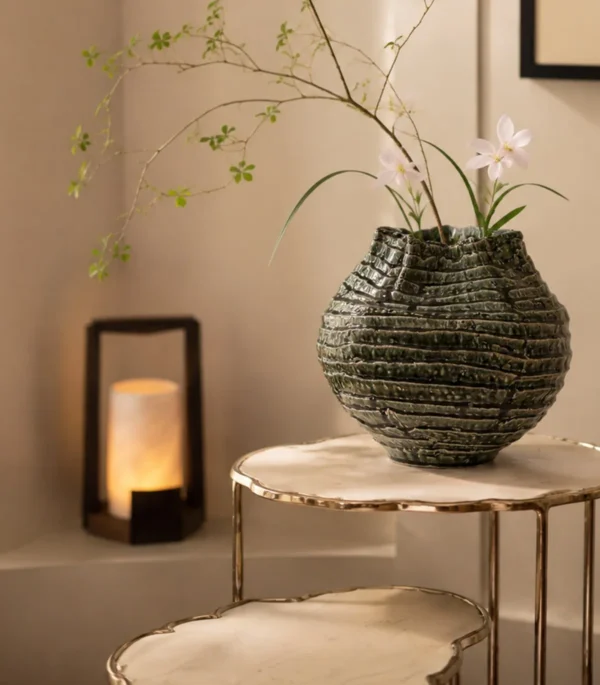 Hand-Made Spiral Layered Stoneware Vase in Moss Green — in a room setting