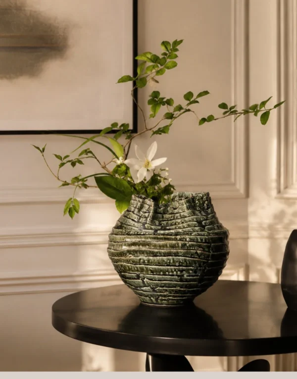 Hand-Made Spiral Layered Stoneware Vase in Moss Green — in a room setting