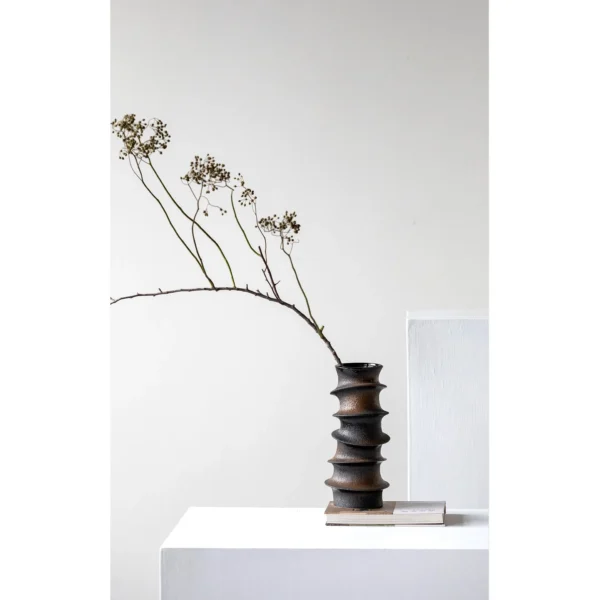 Hand-Made Stacked Spiral Sculpture Vase in Black and Bronze — in a room setting