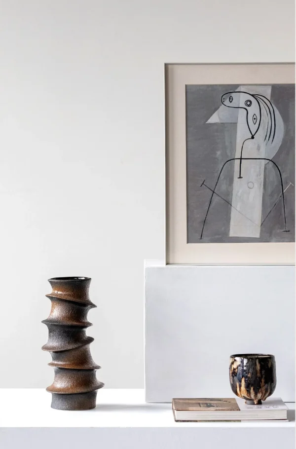 Hand-Made Stacked Spiral Sculpture Vase in Black and Bronze — in a room setting