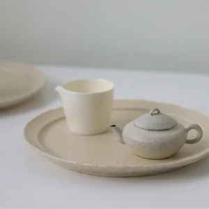 Designer Hand-Made Stoneware Tea Set in Cream — front view