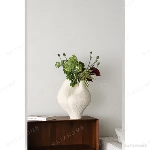 Hand-Built Textured Ceramic Sculpture Vase in Sand White — in a room setting