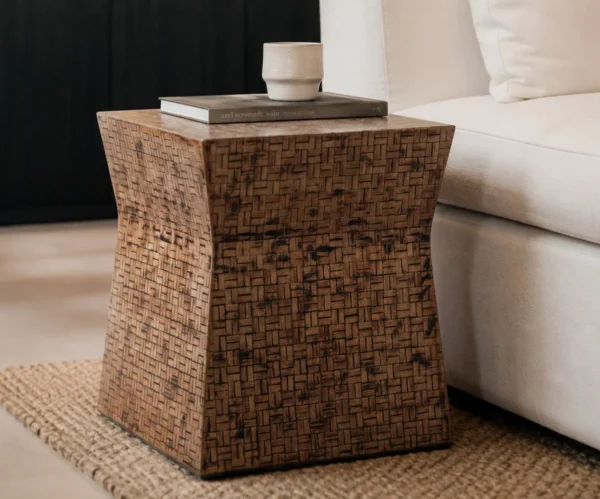 Hand-Woven Bamboo Waisted Cube Side Table in clay — in a room setting