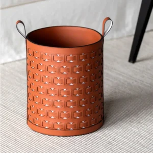 Hand-Woven Orange Leather Laundry Basket with Handles in rust — front view