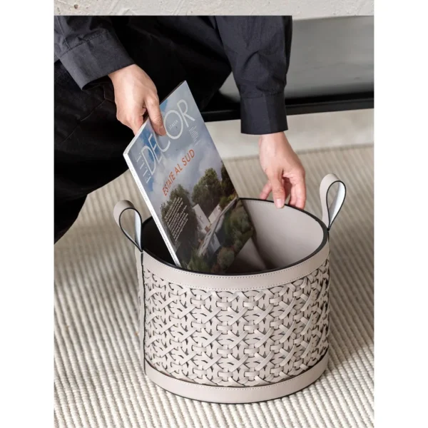 Hand-Woven Leather Storage Basket with Handles in slate — in a room setting