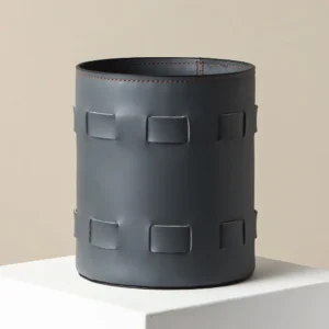 Charcoal Leather Round Storage Bucket with Woven Tabs in slate — front view