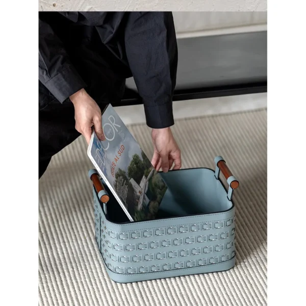 Hand-Woven Leather Storage Basket with Wood Handles in slate — in a room setting