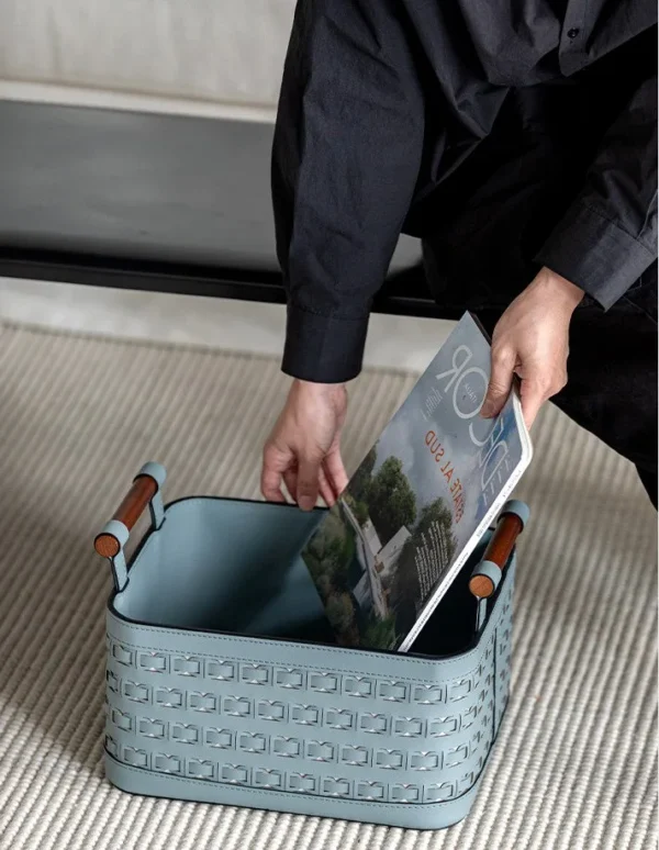 Hand-Woven Leather Storage Basket with Wood Handles in slate — in a room setting