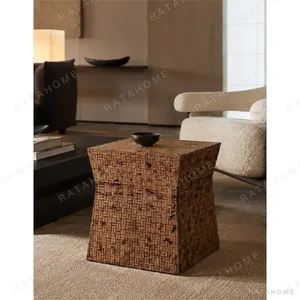 Hand-Woven Bamboo Mid-Century Side Table in Mottled Brown — in a room setting