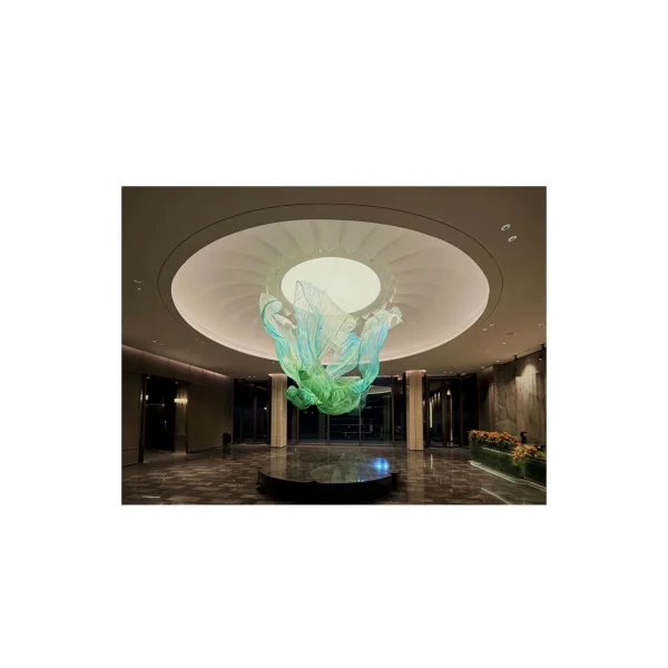 Green and Blue Suspended Flame Art Installation, 300 cm in olive — in a room setting