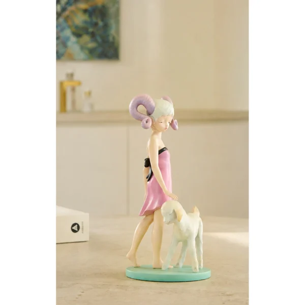 Horned Girl with Lamb Art Figurine in Resin — in a room setting