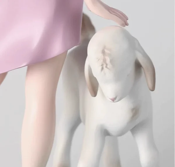 Horned Girl with Lamb Art Figurine in Resin — in a room setting