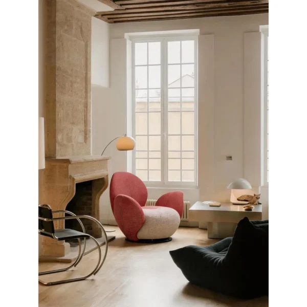 Petal Sculptural Swivel Armchair in Red and Cream — in a room setting