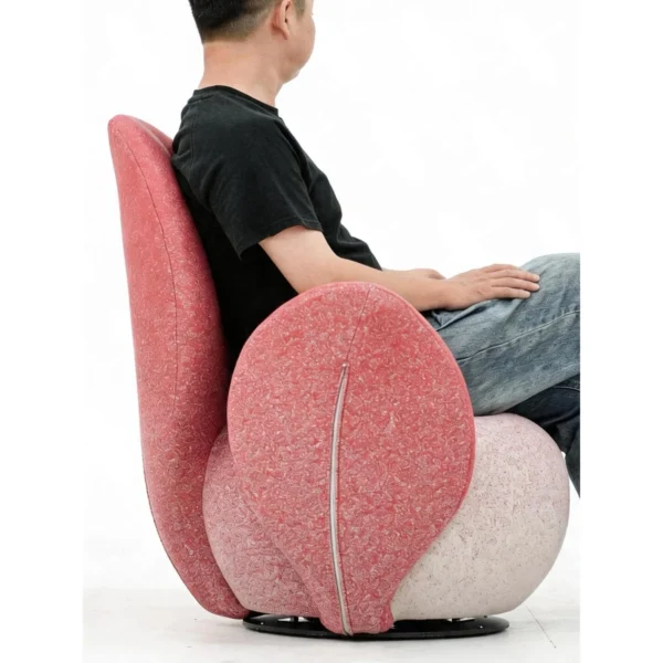 Petal Sculptural Swivel Armchair in Red and Cream — in a room setting
