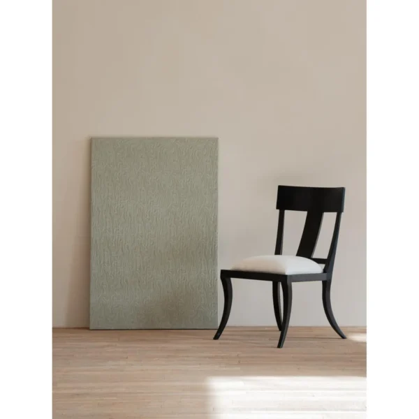 Hera Black Ash Curved-Leg Dining Chair with Linen Seat in black — in a room setting