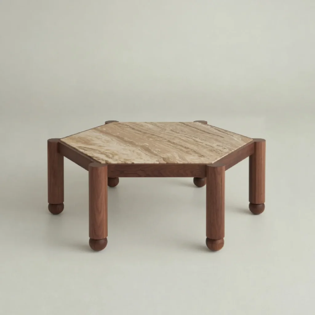 Hexagonal Travertine Coffee Table on Walnut Ball-Foot Legs in sand — front view