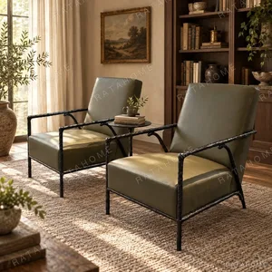 Forged Bronze Frame Lounge Chair in black — in a room setting