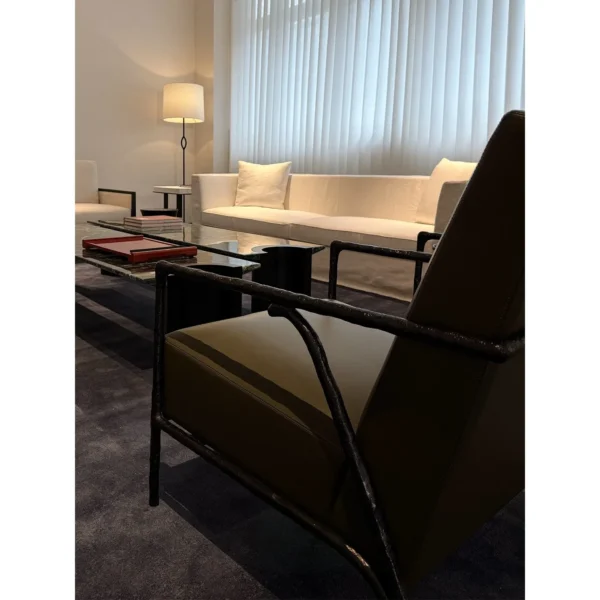 Forged Bronze Frame Lounge Chair in black — in a room setting