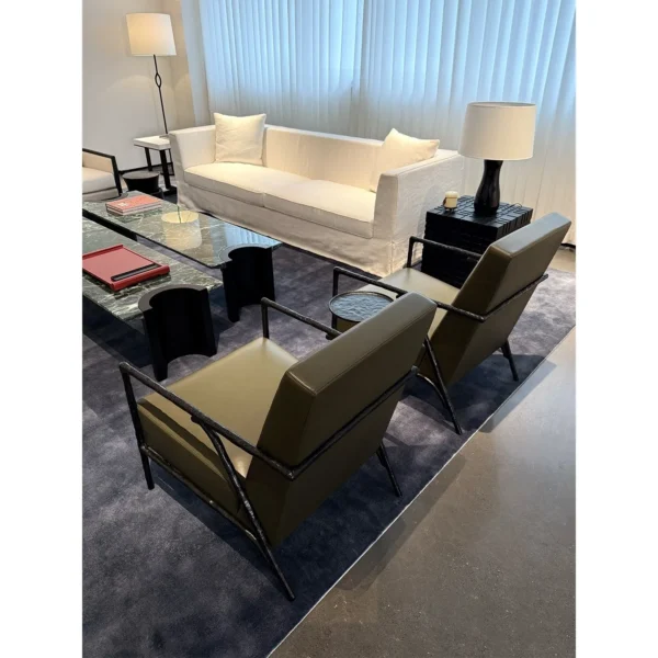 Forged Bronze Frame Lounge Chair in black — in a room setting