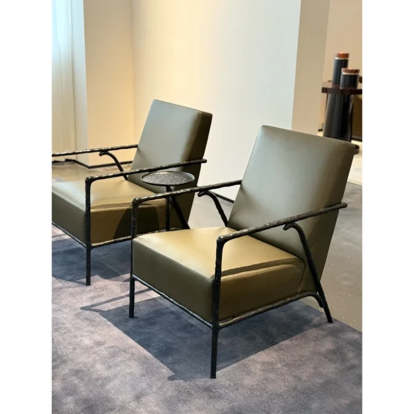 Forged Bronze Frame Lounge Chair in black — in a room setting