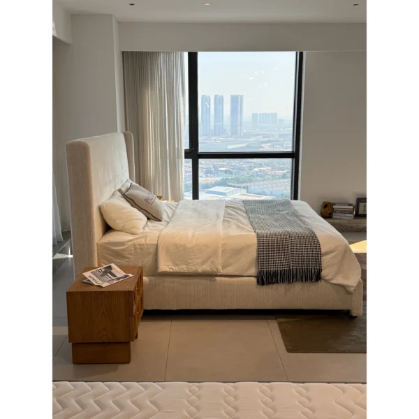 High-Back Wraparound Chenille Bed in sand — in a room setting