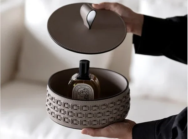 Woven Leather Round Lidded Jewellery Box in slate — in a room setting