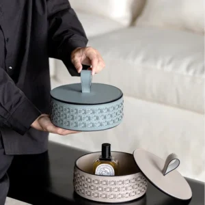 Woven Leather Round Lidded Jewellery Box in slate — in a room setting