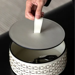 Woven Leather Round Lidded Jewellery Box in slate — in a room setting