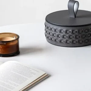 Woven Leather Round Lidded Jewellery Box in slate — in a room setting