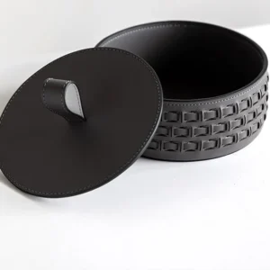 Woven Leather Round Lidded Jewellery Box in slate — in a room setting