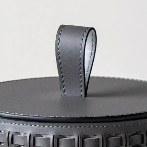 Woven Leather Round Lidded Jewellery Box in slate — in a room setting