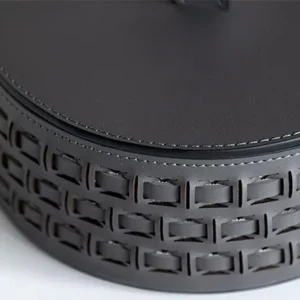 Woven Leather Round Lidded Jewellery Box in slate — in a room setting