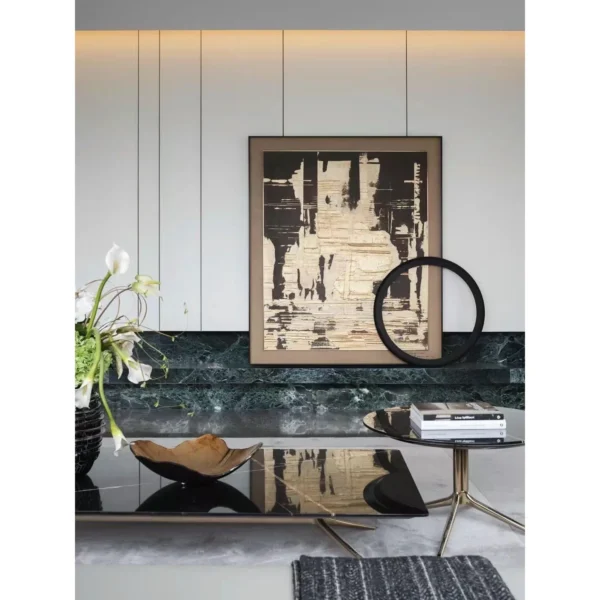 Black and Gold Abstract Wall Art in Slim Frame — in a room setting