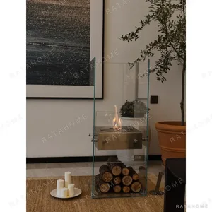 Glass Bio-Ethanol Tabletop Fireplace with Stainless Burner in silver — in a room setting