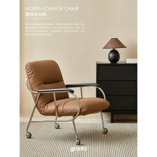 S-Curve Lounge Chair in Cognac Leather on Steel Frame — in a room setting