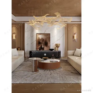 Carson Marble and Leather Coffee Table Set in clay — in a room setting