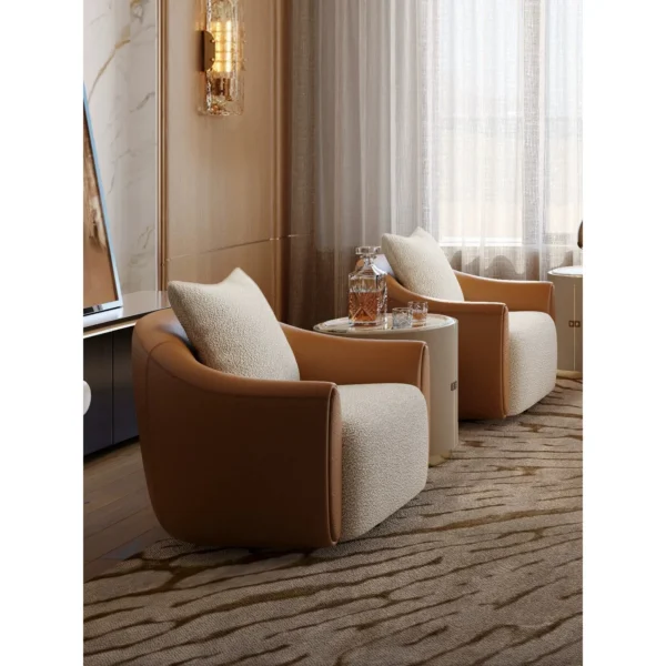 Carson Tan Leather and Cream Bouclé Lounge Chair in clay — in a room setting