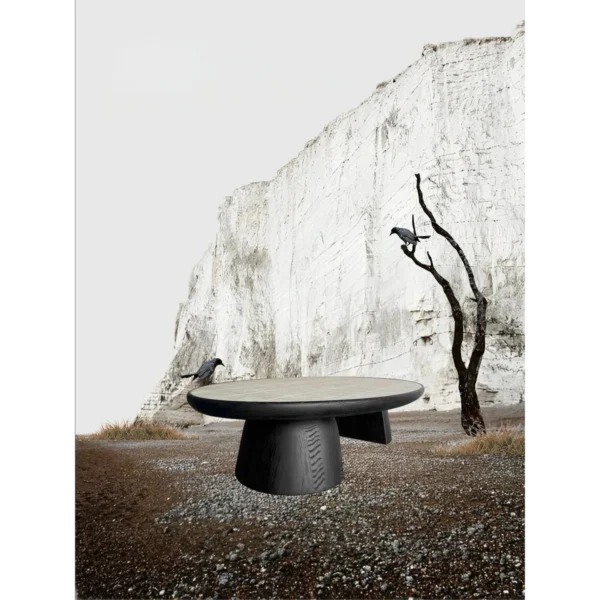 Huajing Round Coffee Table in black — in a room setting