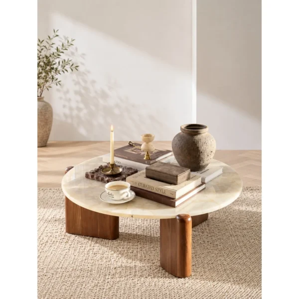 Ice Age Marble Round Coffee Table on Walnut Legs in oatmeal — in a room setting
