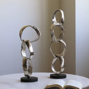 Imported Aluminium Ring Sculptures on Black Base, Two Forms in silver — front view