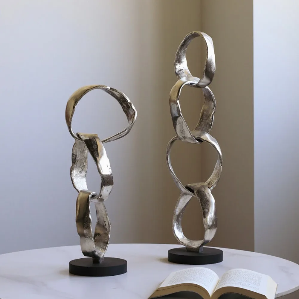 Imported Aluminium Ring Sculptures on Black Base, Two Forms in silver — front view